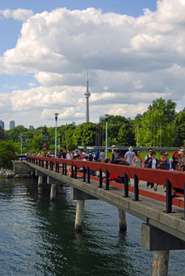 people walking along the pier